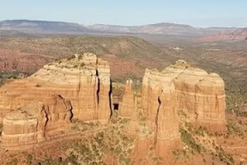 a canyon with a mountain in the background