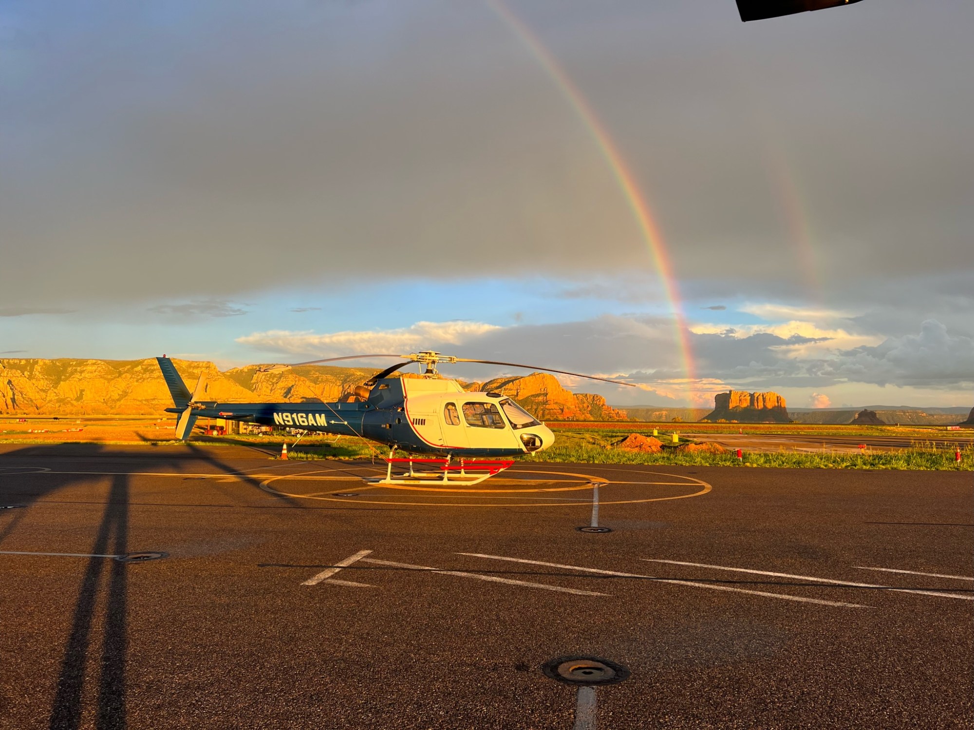 a rainbow over a field