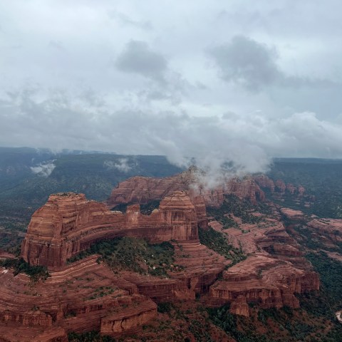 a canyon with a mountain in the background