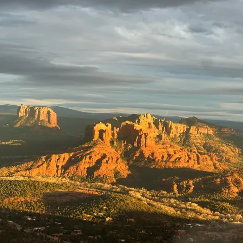 a canyon with a sunset in the background