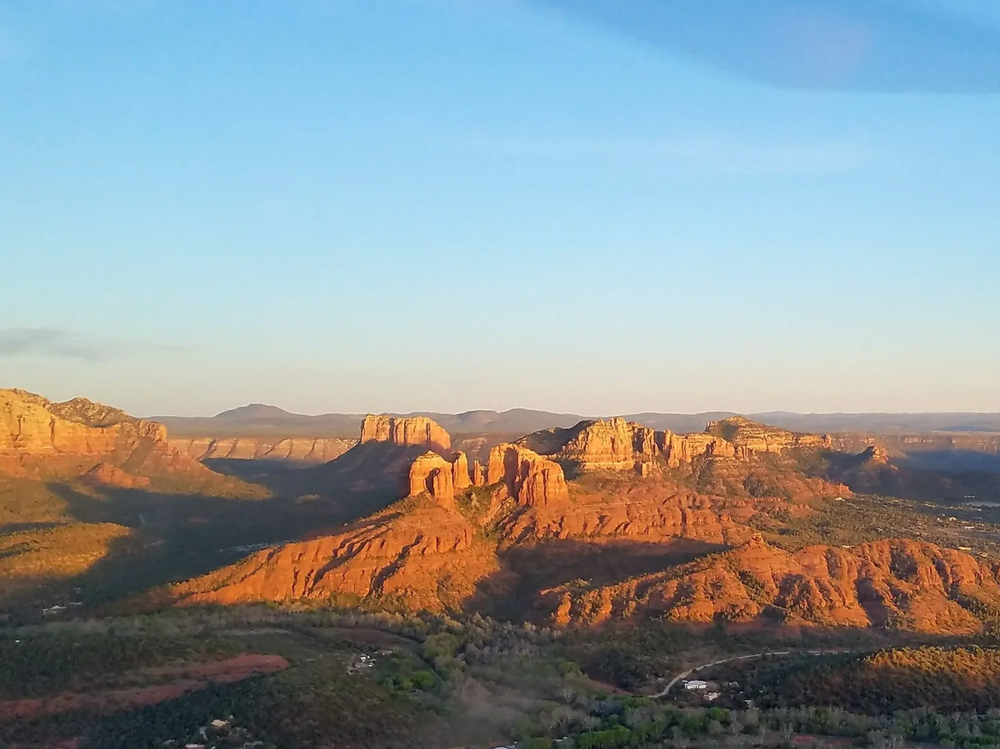 tourpagesedona a canyon with a sunset in the background