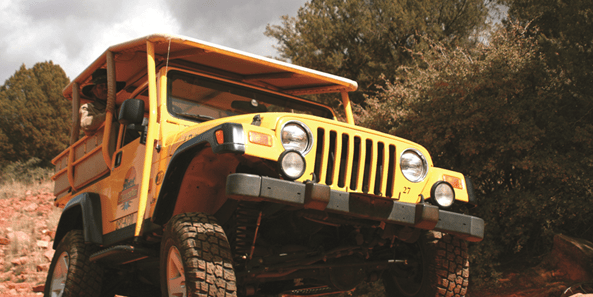 Diamondback Gulch Image 1 a truck driving down a dirt road