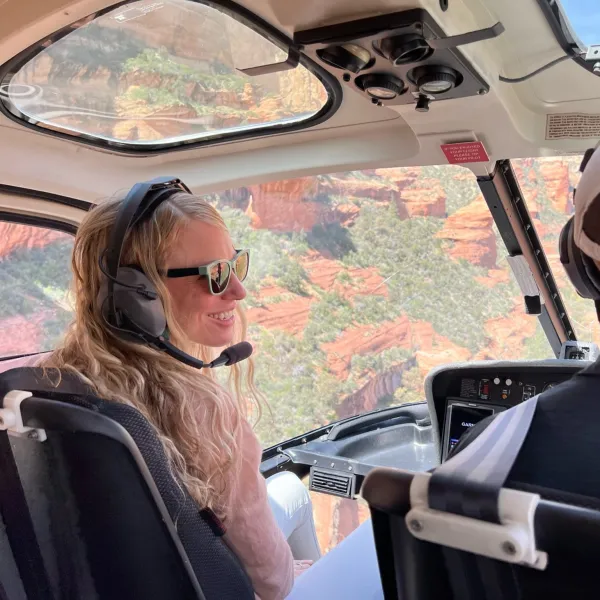 Tourist on a apex helicopter scenic tour